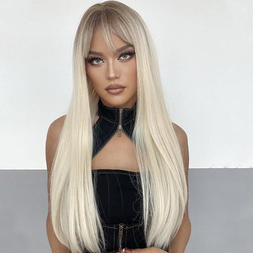 HAIRCUBE long straight synthetic wig with bangs in blonde worn by model with natural makeup