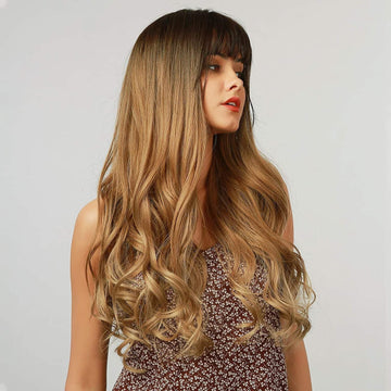 HAIRCUBE long wavy synthetic wig with bangs in a brown ombre color on a female model