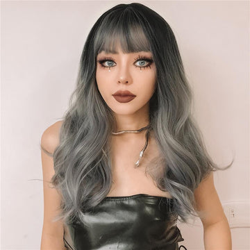 HAIRCUBE silver synthetic wig with bangs styled in loose waves on a female model