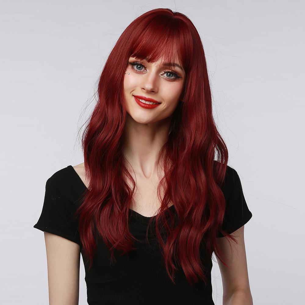 HAIRCUBE 18 inch red wine wig with long wavy hair and fringe on a woman wearing a black top