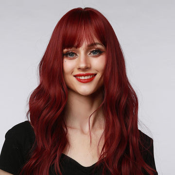 HAIRCUBE 18 inch red wine wig with long wavy hair and bangs worn by a woman