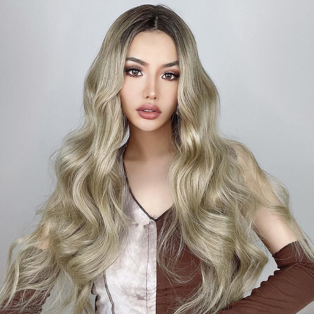 HAIRCUBE 21 inch loose curls wig in blonde with dark roots styled on model