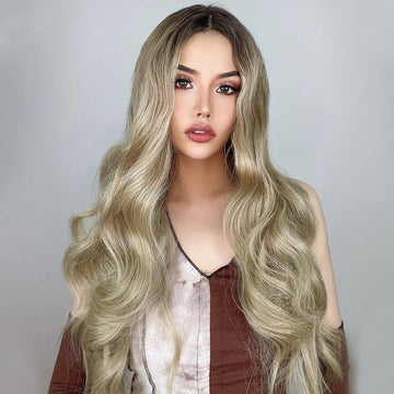 HAIRCUBE 21 inch loose curls wig styled on a model with long blonde wavy hair