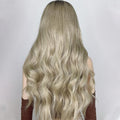 HAIRCUBE 21 inch loose curls wig in blonde displayed from the back with soft flowing waves