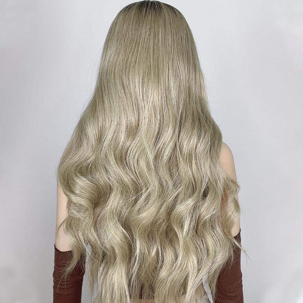 HAIRCUBE 21 inch loose curls wig in blonde displayed from the back with soft flowing waves
