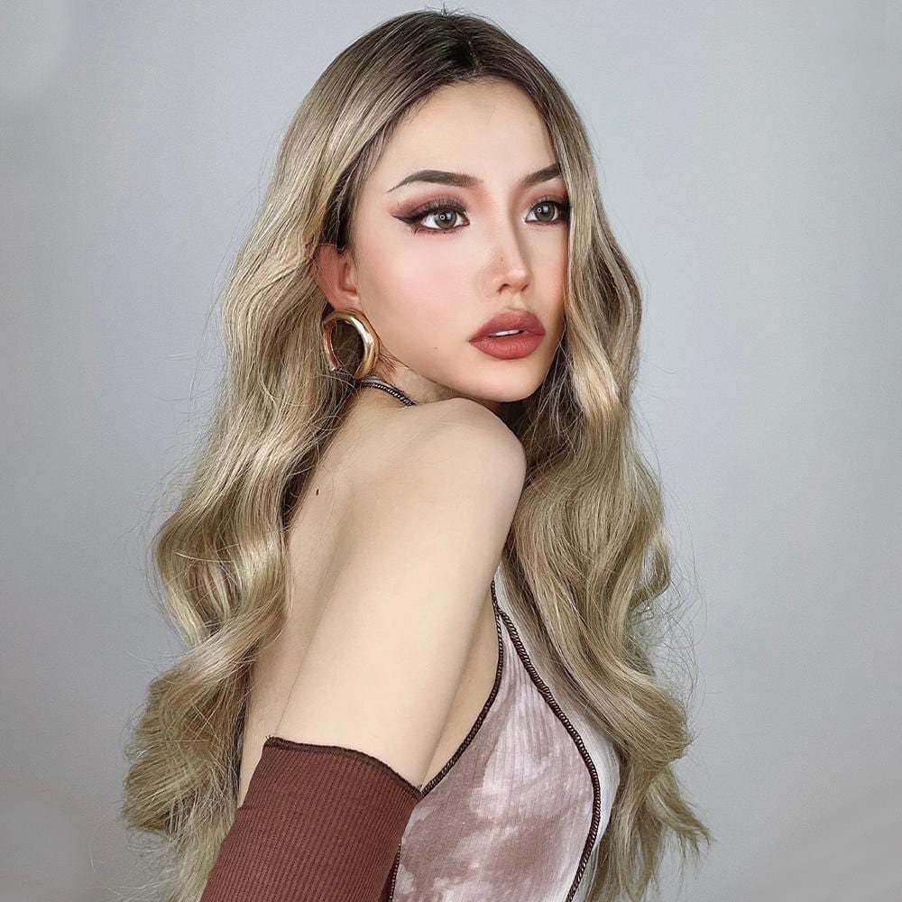HAIRCUBE 21 inch loose curls wig with long blonde wavy hair styled on model