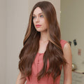 HAIRCUBE 21 inch synthetic lace part wig with long brown wavy hair styled on woman