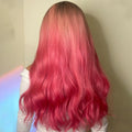 HAIRCUBE 22 inch body wave wig with pink ombre color and long flowing waves from the back