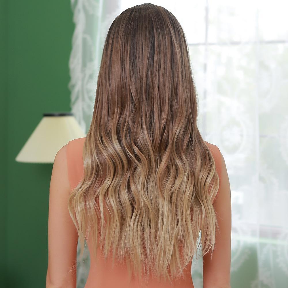 HAIRCUBE 22 inch loose wave lace front wig shown from back with long wavy brown to blonde hair