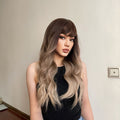 HAIRCUBE 23 inch ombre ash blonde wig with long wavy hair and side bangs on model wearing black top