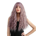26 inch synthetic wig with bangs in wavy lavender style worn by woman in black top