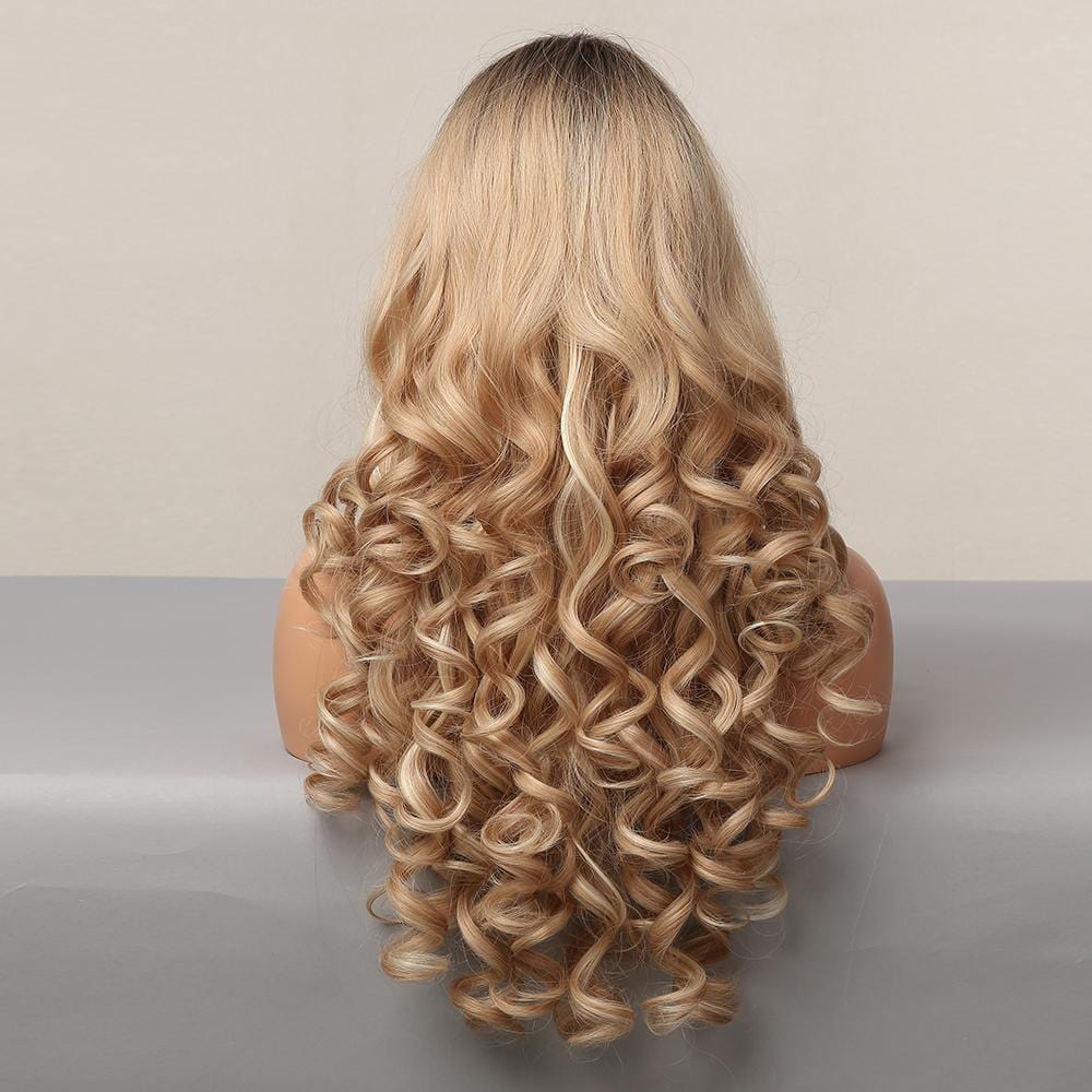 HAIRCUBE blonde synthetic wig with bangs featuring long loose curls from the back