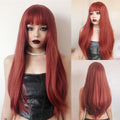 HAIRCUBE firebrick red long wavy wig with bangs styled on mannequin wearing black leather top