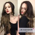 Alan ombre brown synthetic wig styled on a model with long wavy hair and dark to light brown shades