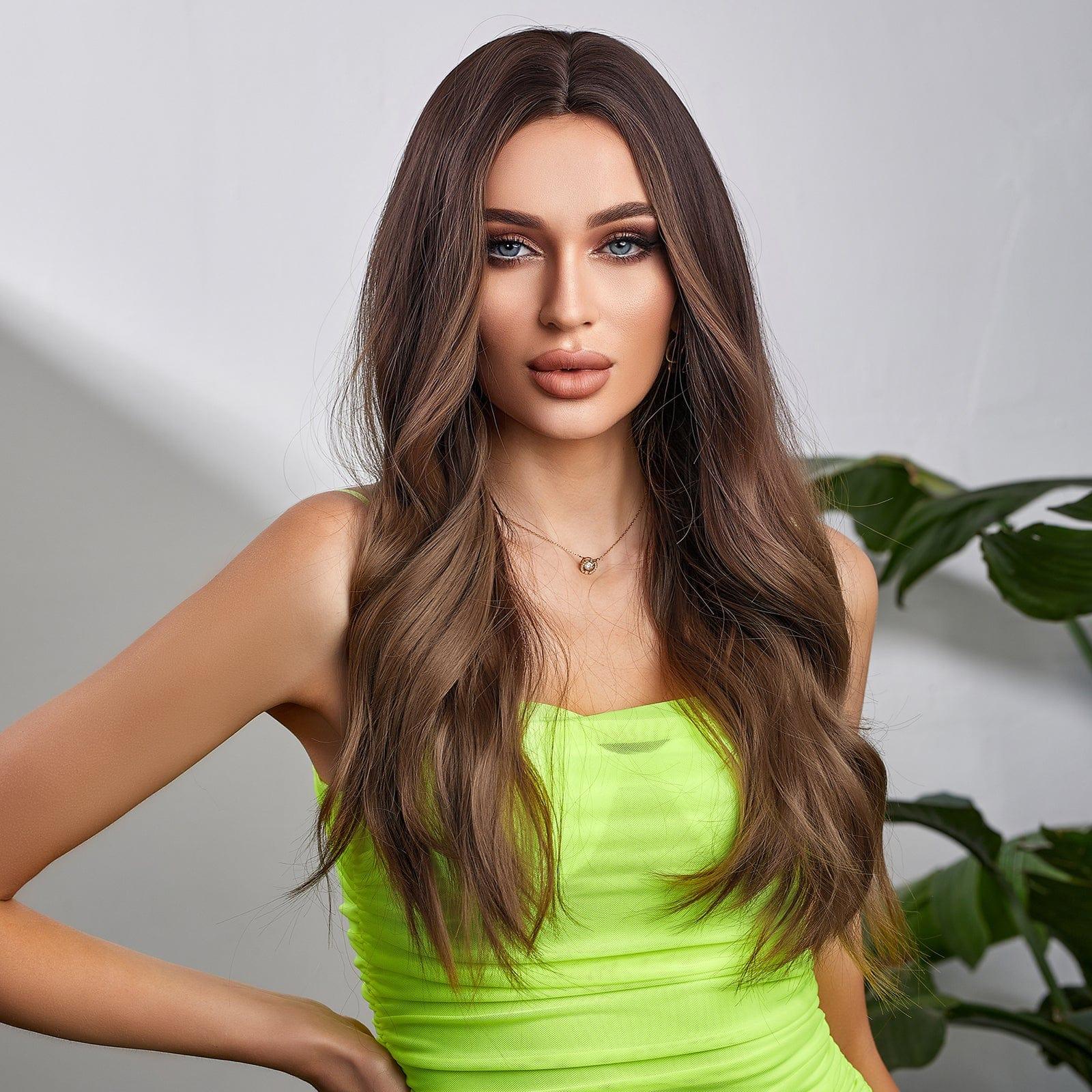Woman wearing an ombre brown synthetic wig with long wavy hair styled by Alan