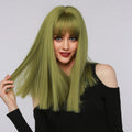 La Sylphide lime green synthetic wig with long straight hair and bangs on woman in black top