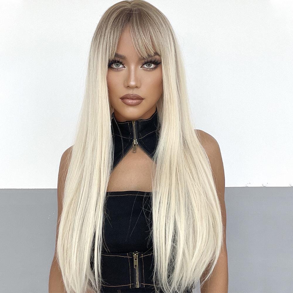 HAIRCUBE long straight synthetic wig with bangs in platinum blonde on model with black outfit