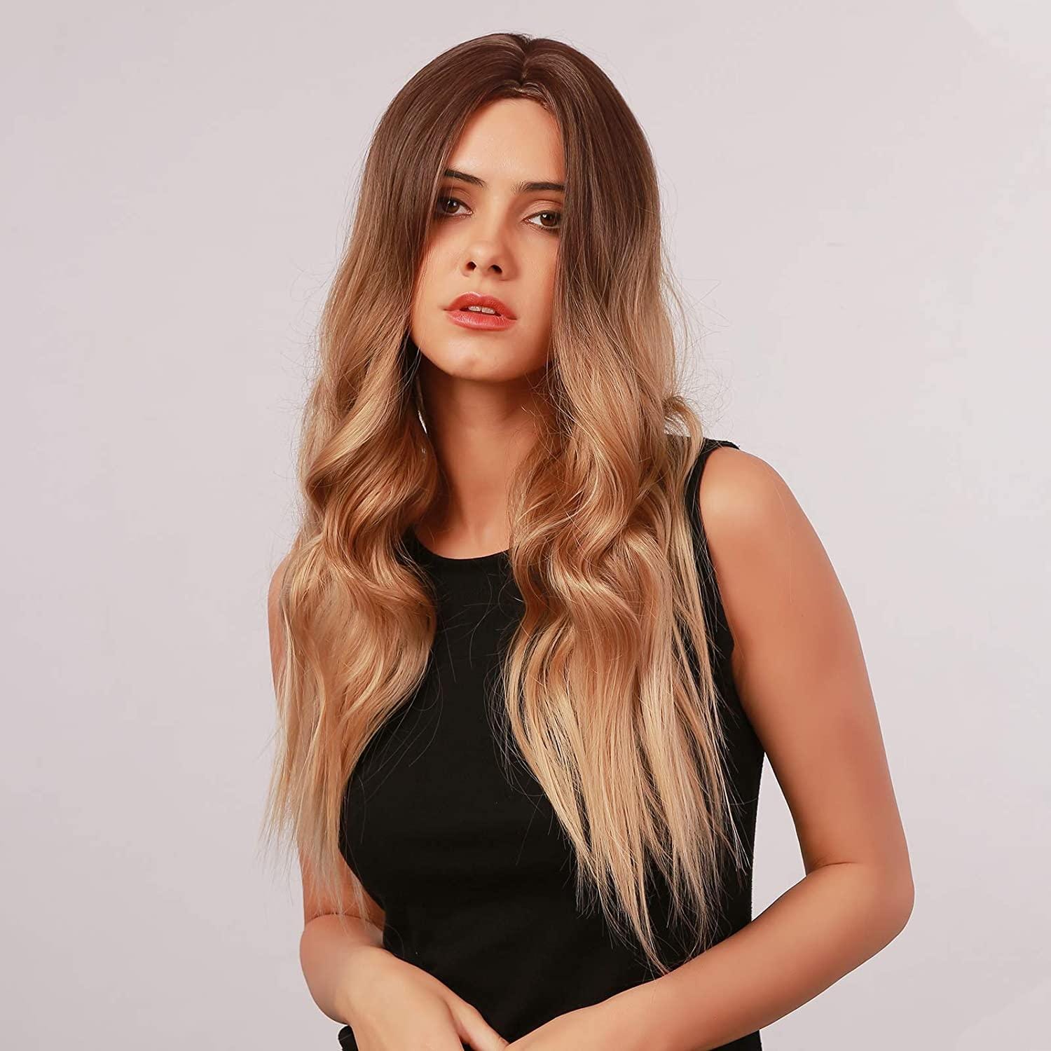HAIRCUBE long wavy brown to ash blonde wig worn by model with black sleeveless top