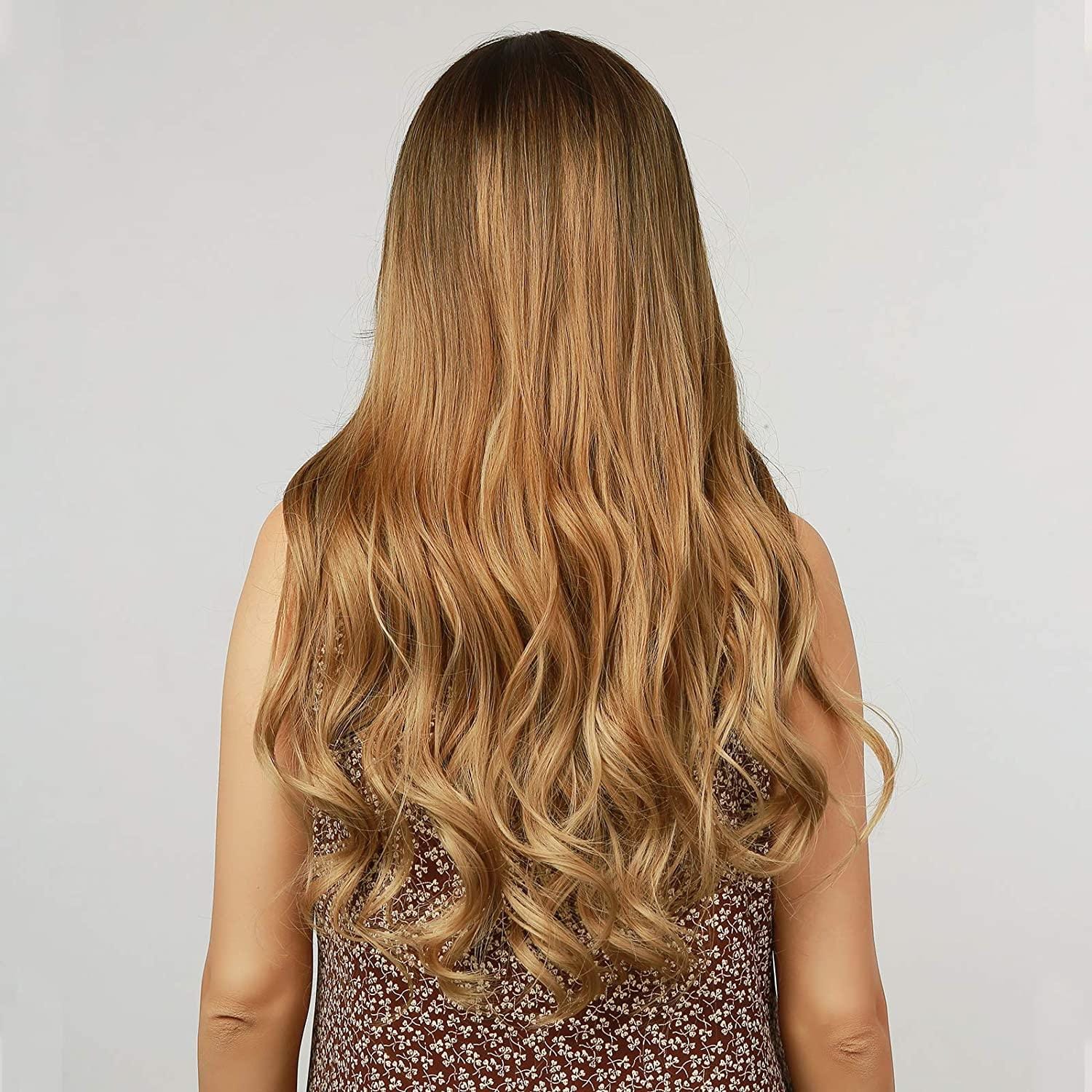 HAIRCUBE long wavy synthetic wig with bangs shown from the back in golden brown color