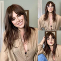 HAIRCUBE natural looking brown human hair wig styled with soft waves and side bangs on model