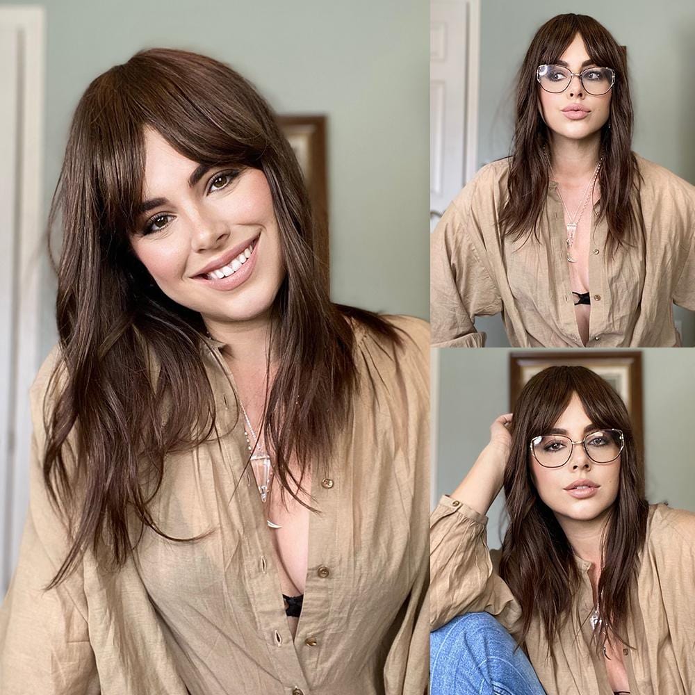 HAIRCUBE natural looking brown human hair wig styled with soft waves and side bangs on model
