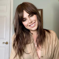 HAIRCUBE natural looking brown human hair wig styled with long layered cut and side bangs