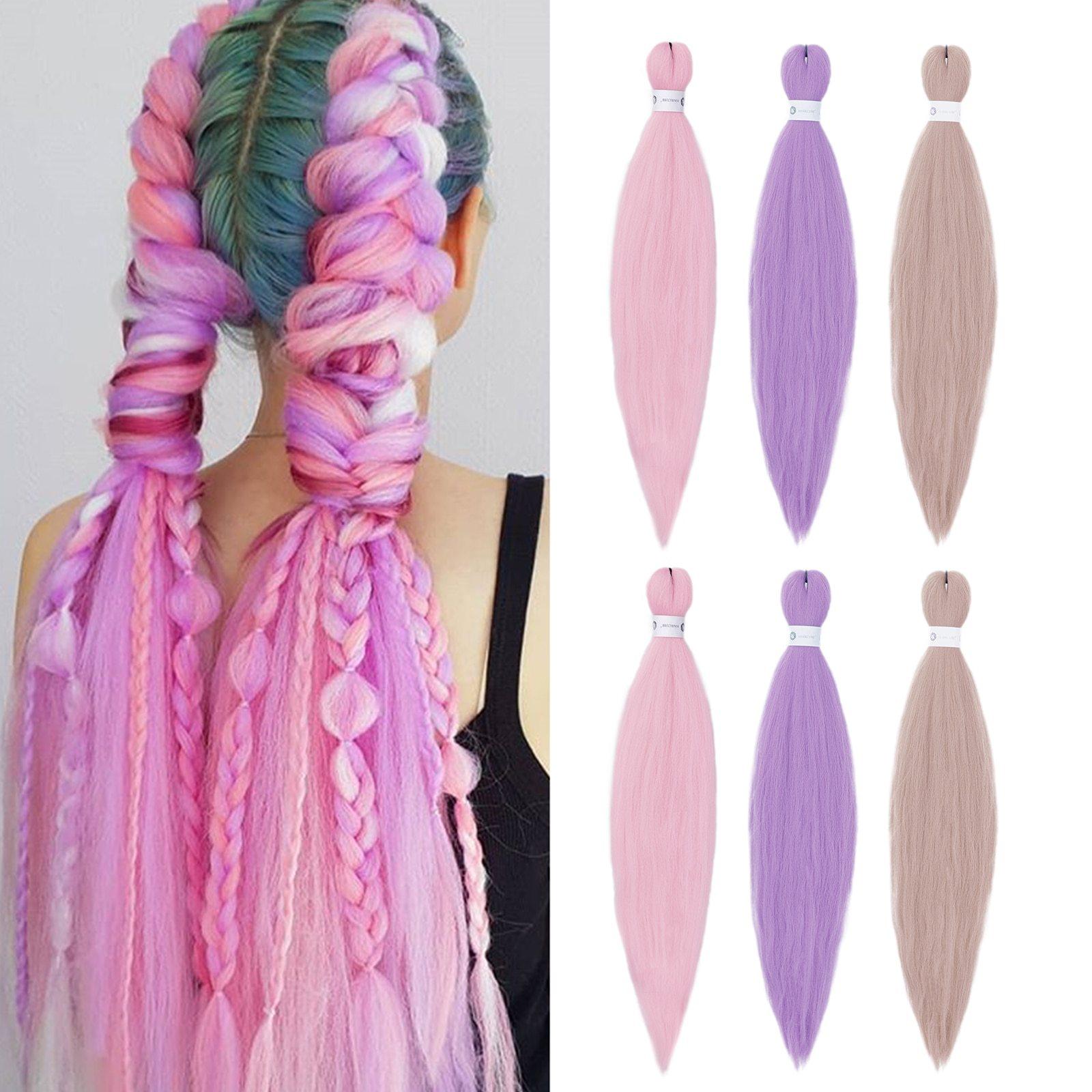 HAIRCUBE peach pink hair extensions styled in long braided wig with additional purple and beige extensions