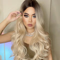 HAIRCUBE 21 inch synthetic wig with long wavy blonde and dark roots hairstyle