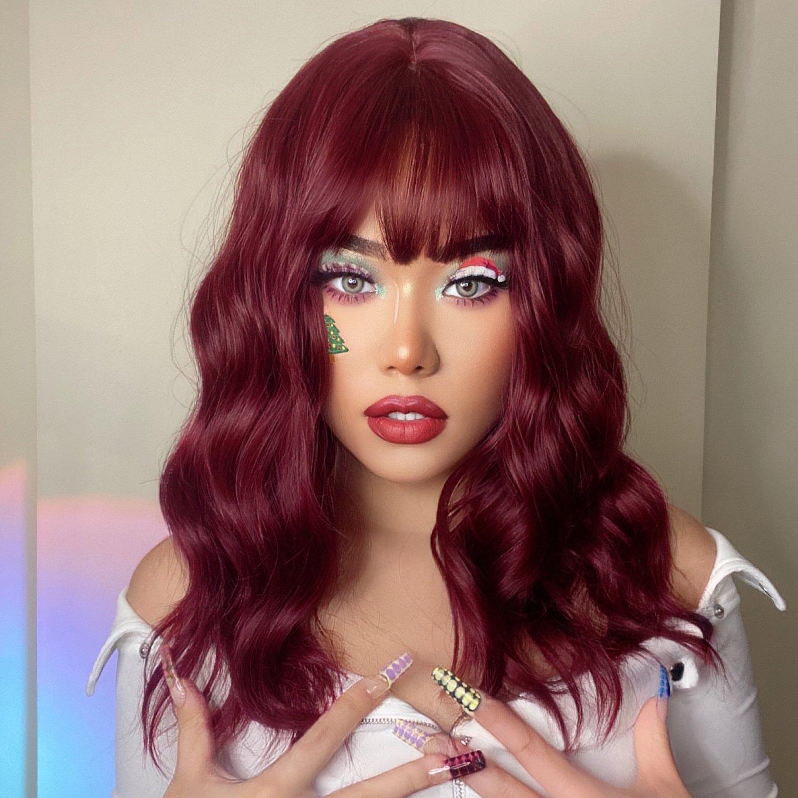 HAIRCUBE red wine spiral wave wig with soft waves and full bangs on a model