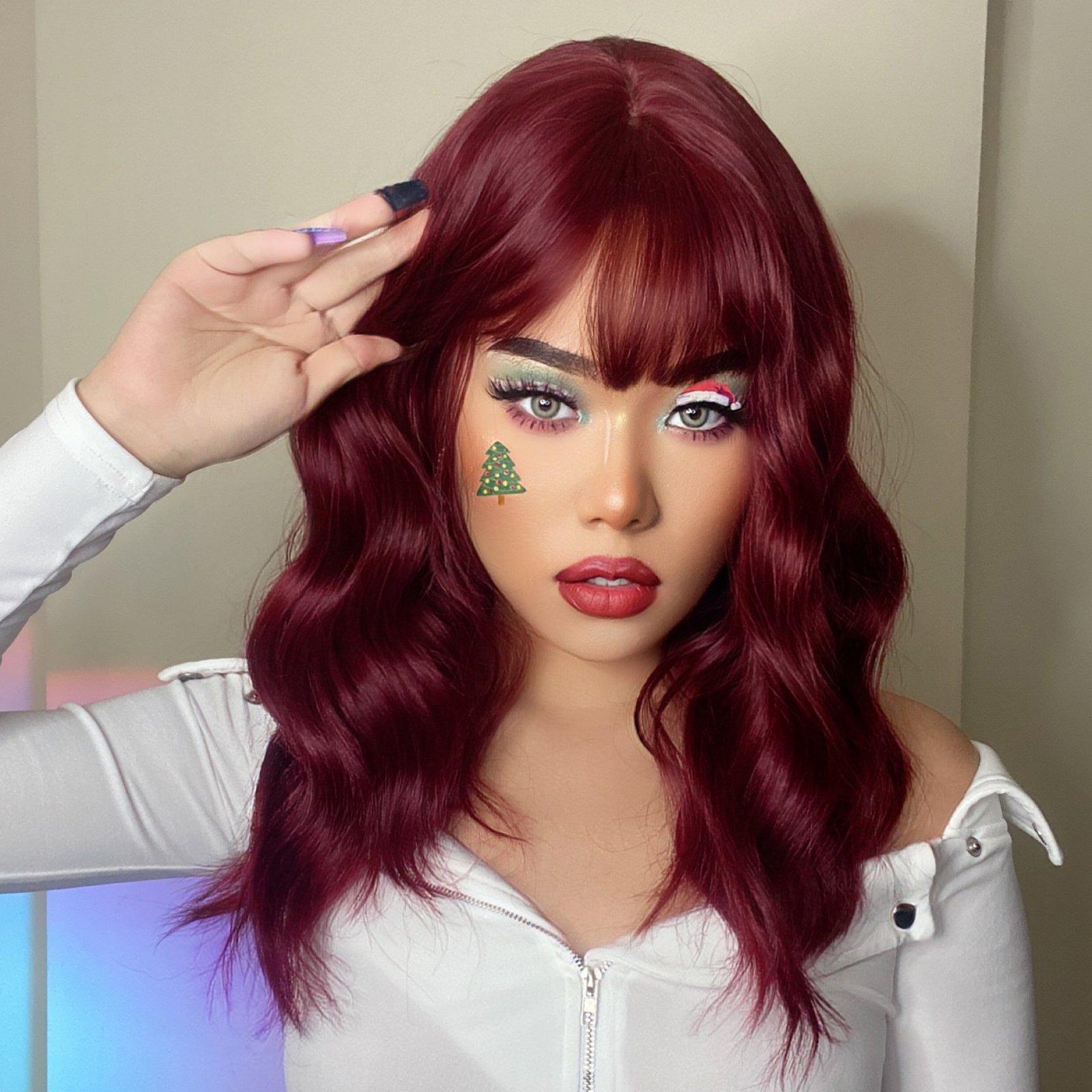 HAIRCUBE red wine spiral wave wig on model with medium length wavy hair and bangs