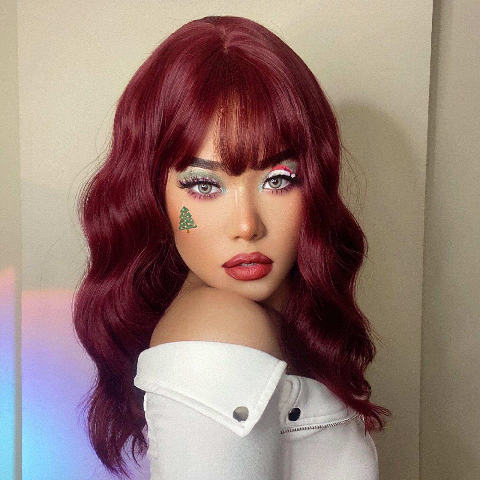 HAIRCUBE red wine spiral wave wig with soft waves and bangs styled on model