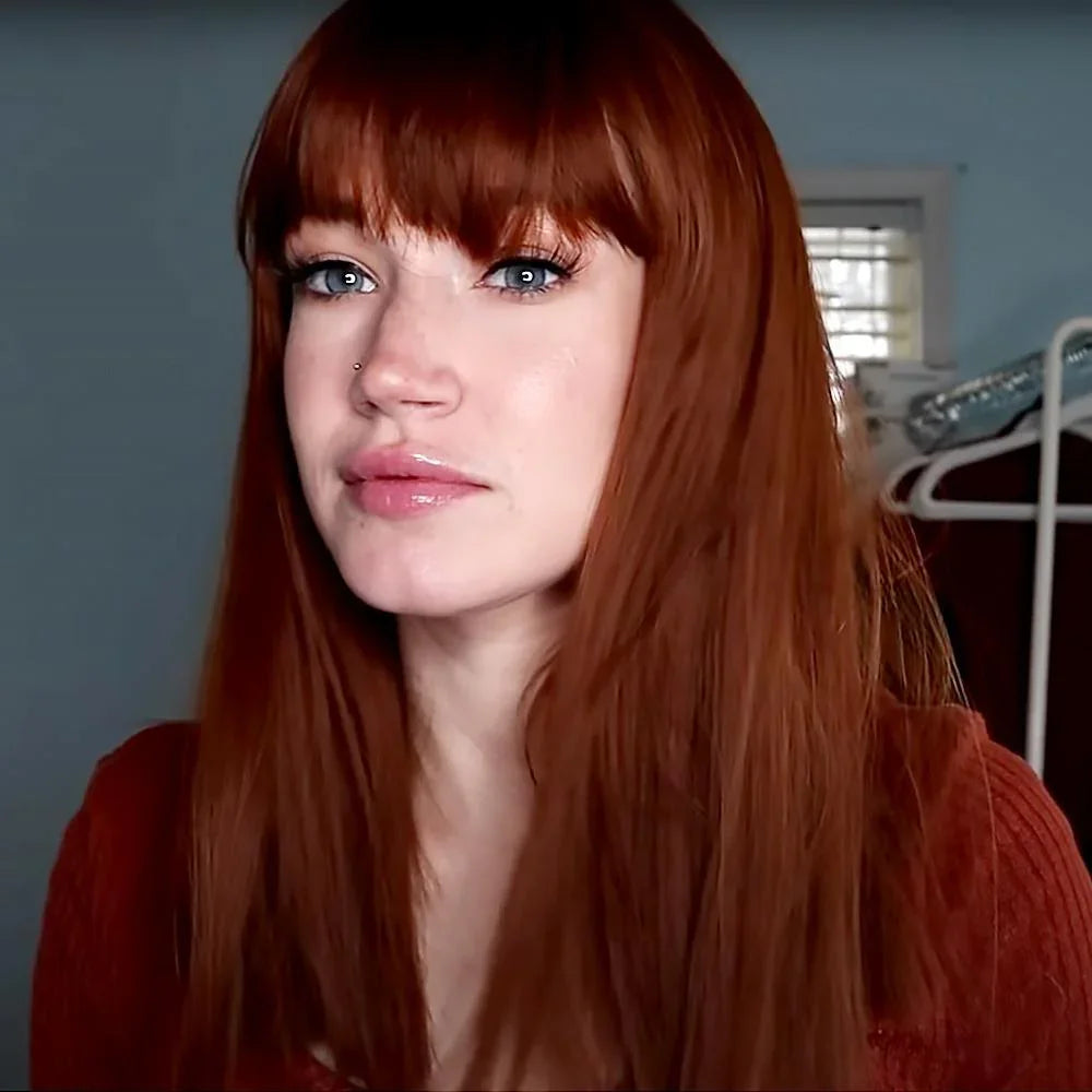 HAIRCUBE reddish brown synthetic wig with long straight hair and bangs on female model