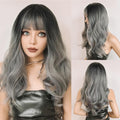 HAIRCUBE silver synthetic wig with bangs featuring long wavy hair and black to silver ombre color