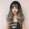 HAIRCUBE silver synthetic wig with bangs featuring long wavy hair and dark roots for stylish looks