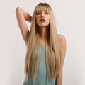 HAIRCUBE straight synthetic wig with bangs long blonde hair worn by woman in blue sleeveless top