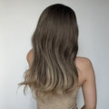 HAIRCUBE 20 inch ombre curly wig shown from the back with dark roots fading to blonde curls