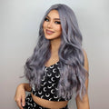 HAIRCUBE 20 inch ombre curly wig with long wavy gray hair styled on a smiling woman