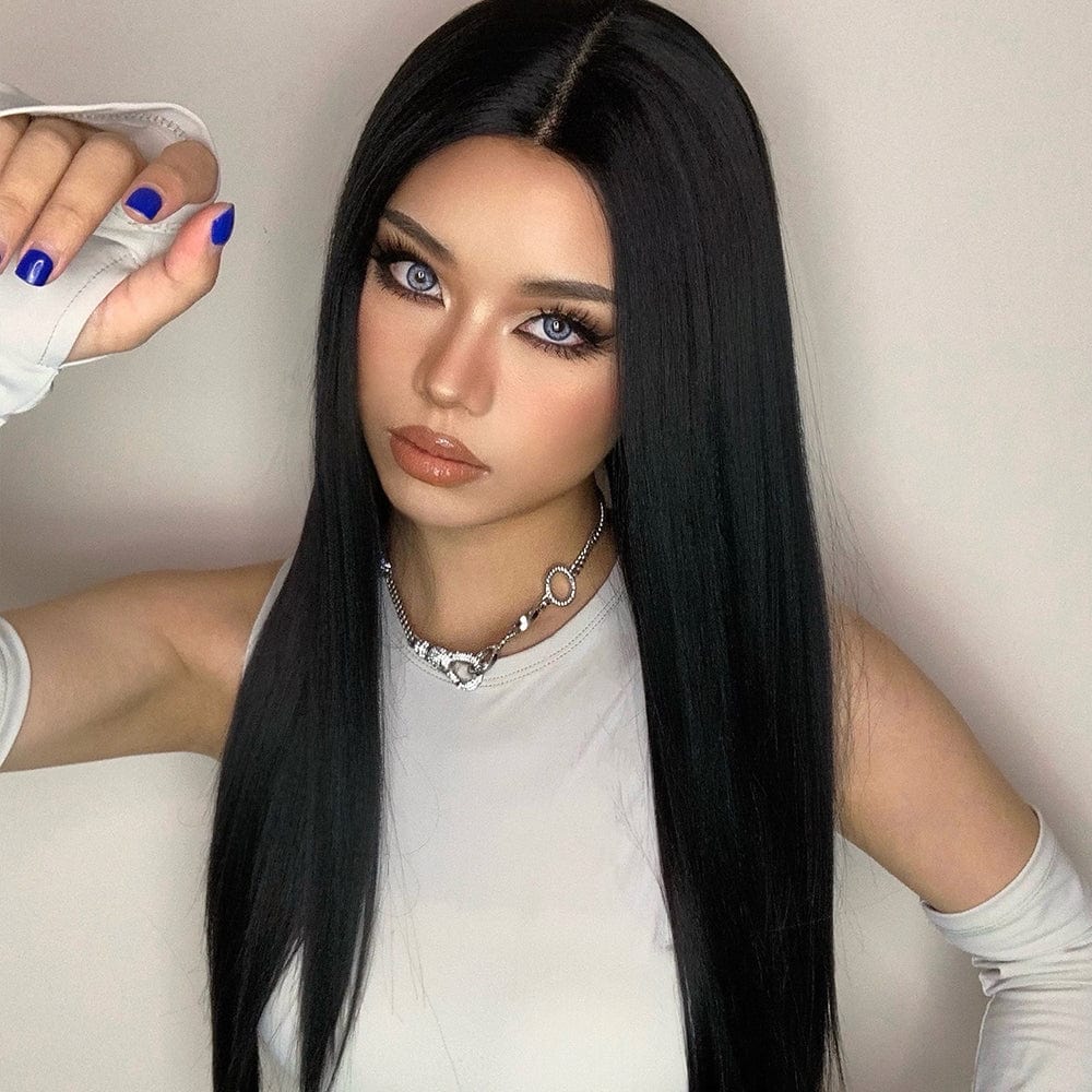 HAIRCUBE 23 inch free part synthetic wig worn by model with long straight black hair