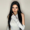 HAIRCUBE 23 inch free part synthetic wig with long straight black hair styled on model