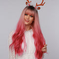 La Sylphide 23 inch pink ombre cosplay wig styled with soft waves and bangs