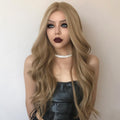 HAIRCUBE honey blonde lace front wig with long wavy hair styled on mannequin with choker necklace
