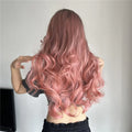 oneNonly long wavy pink wig styled with loose curls on a person shown from the back
