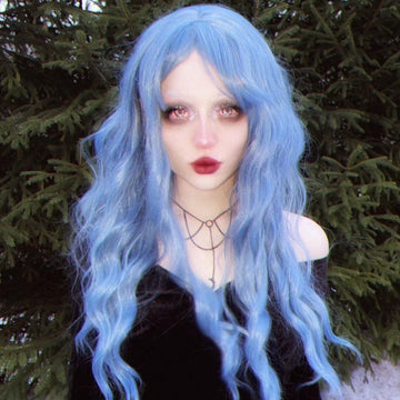 HAIRCUBE mermaid blue synthetic wig with long wavy hair styled on model outdoors