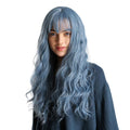 HAIRCUBE mermaid blue synthetic wig with long wavy hair and bangs on a woman