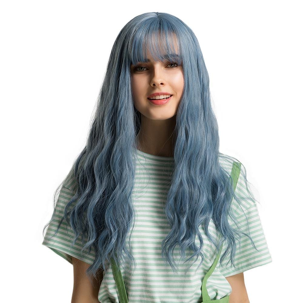 HAIRCUBE mermaid blue synthetic wig with long wavy hair and bangs on a smiling model
