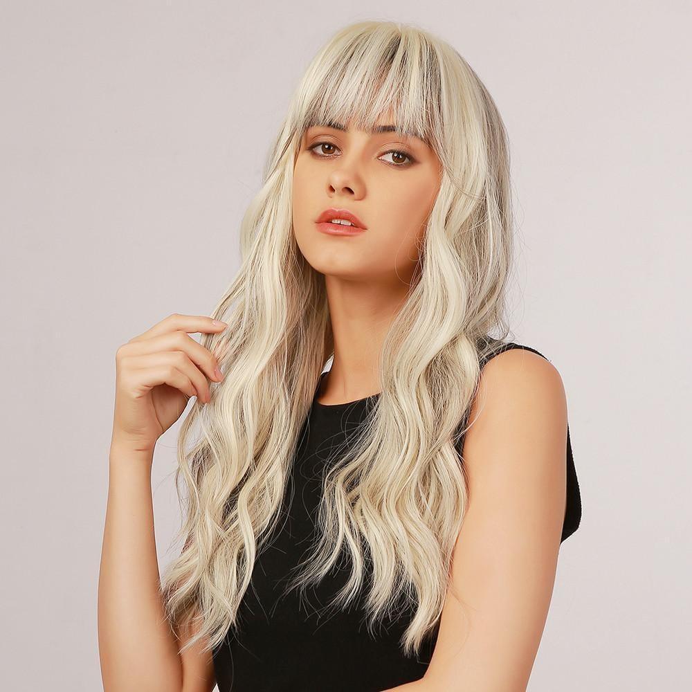 La Sylphide 22 inch loose wave synthetic wig in platinum blonde with bangs on woman