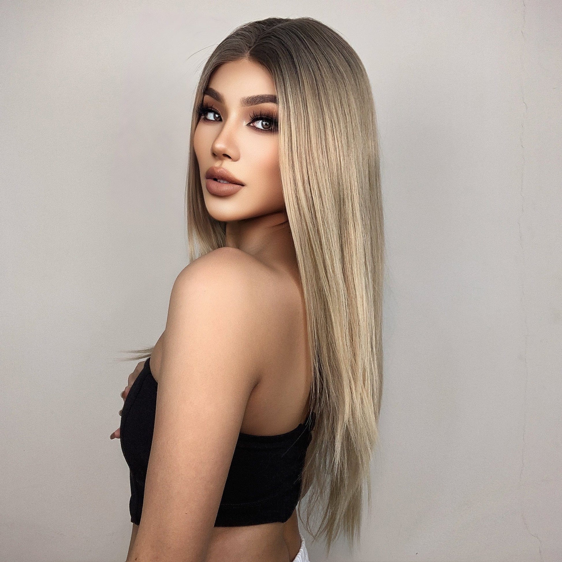 HAIRCUBE 21 inch straight lace front wig with long smooth blonde hair on model